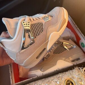 Jordan 4 Frozen Moments